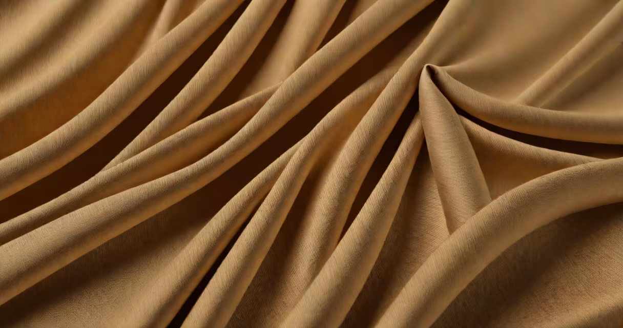 Close-up of Tencel fabric showing its smooth, slightly shiny texture